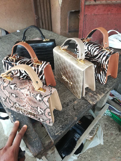 A collection of stylish bags displayed on a wooden table with natural light highlighting their textures.
