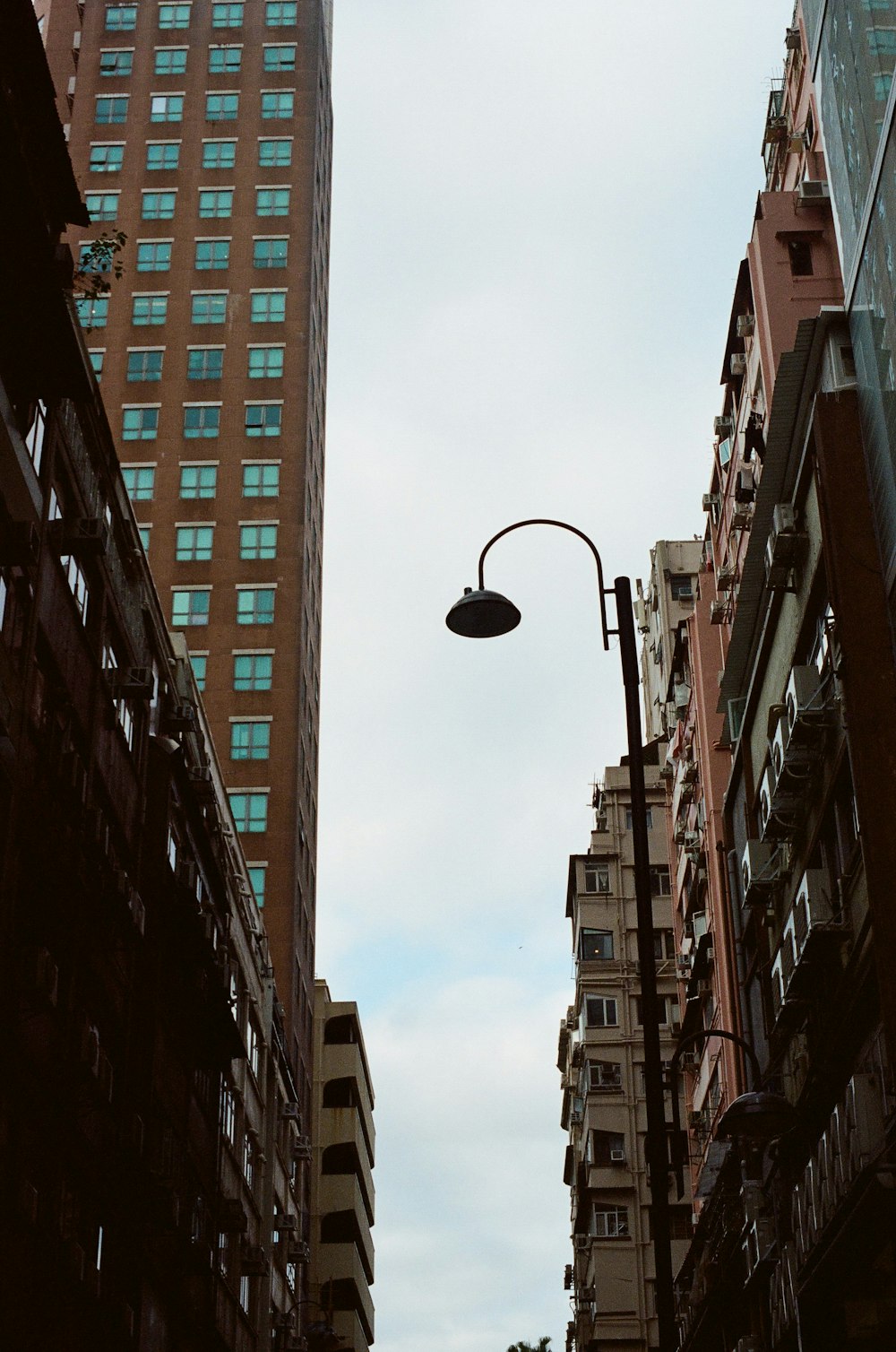 a street light in the middle of a city