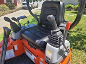 Close-up of heavy equipment controls ready for operation on a Bali site.