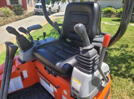 Close-up of heavy equipment controls ready for operation on a Bali site.