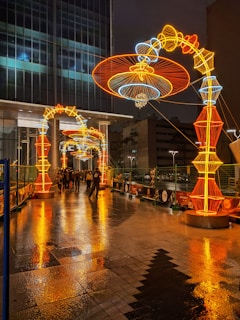 Night view of Lapa arches lit up with lively samba dancers nearby
