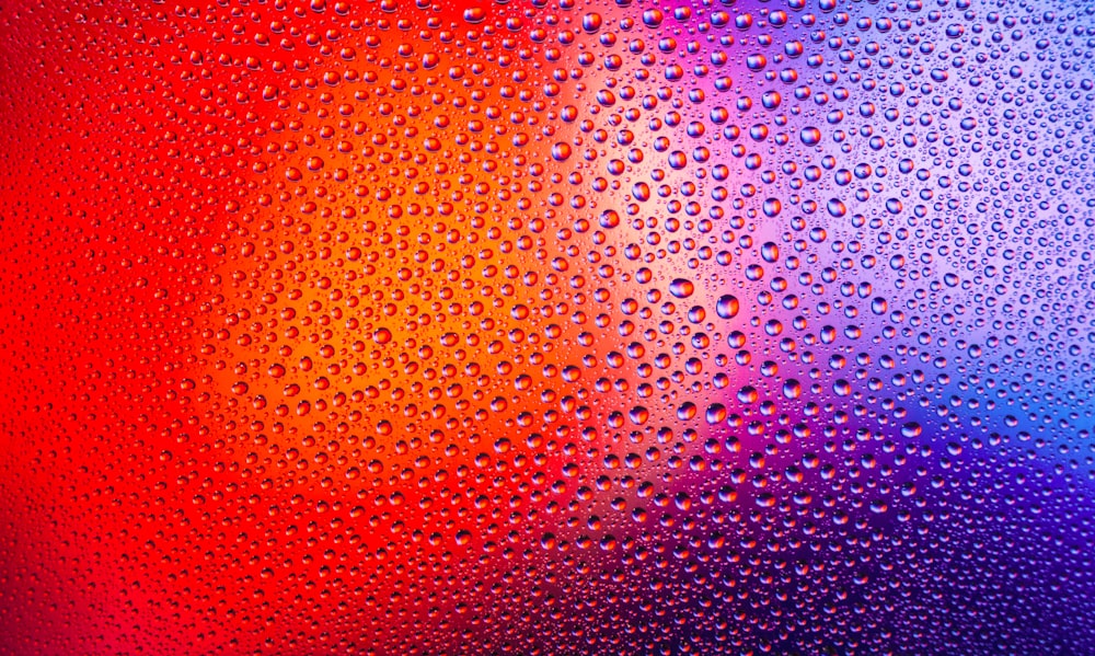 a close up of water droplets on a window