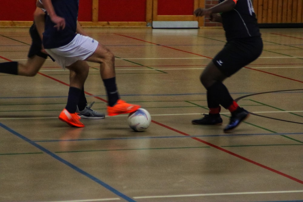 a group of young men playing a game of soccer