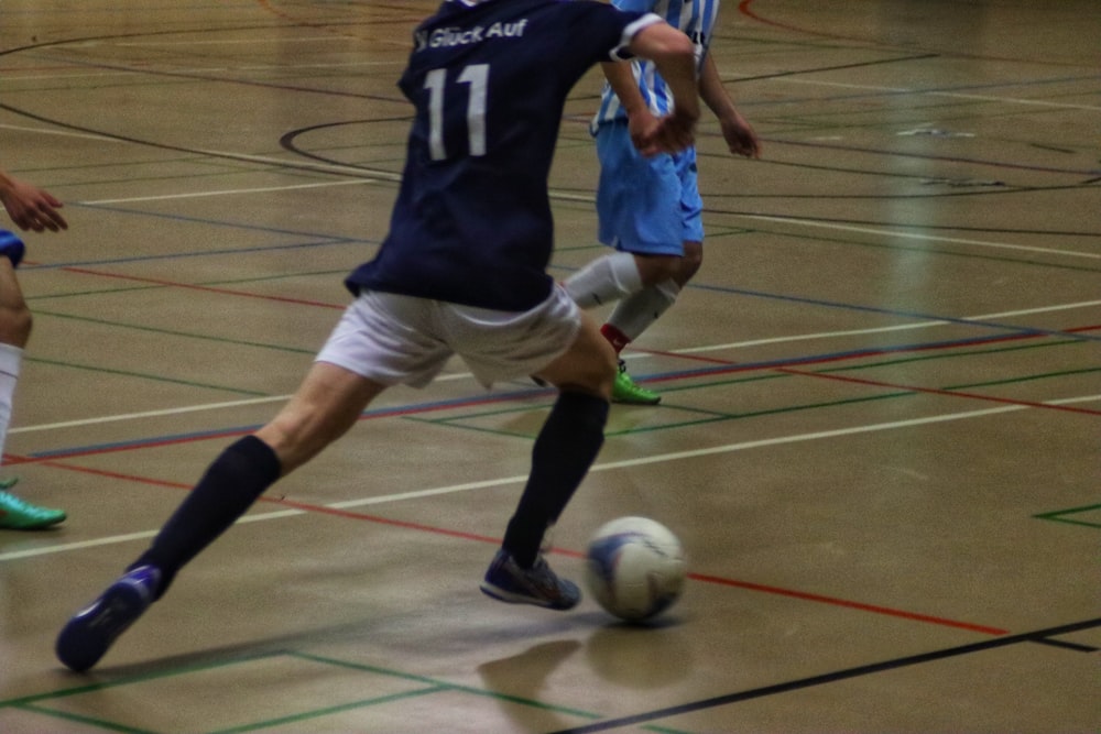 a group of young men playing a game of soccer