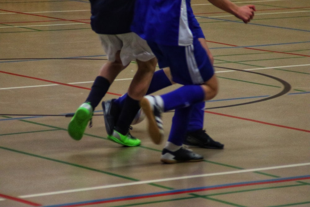 a group of young men playing a game of soccer