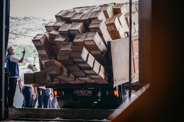 a truck with a bunch of boxes on the back of it