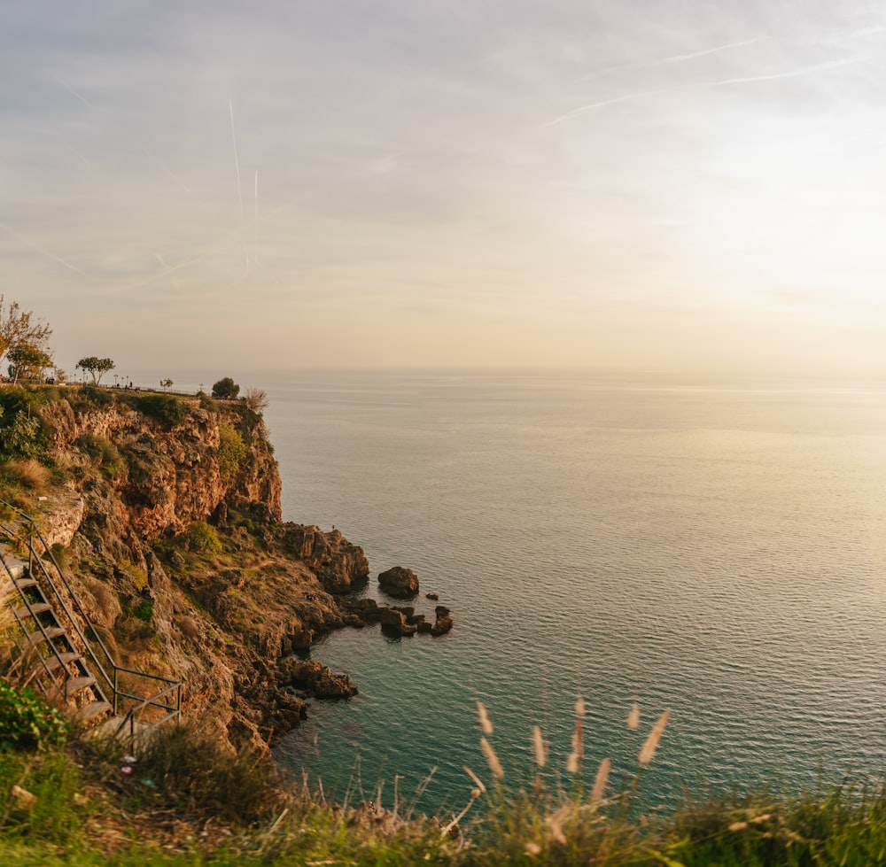 a view of the ocean from a cliff