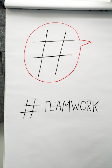 a piece of paper with a red marker drawn on it