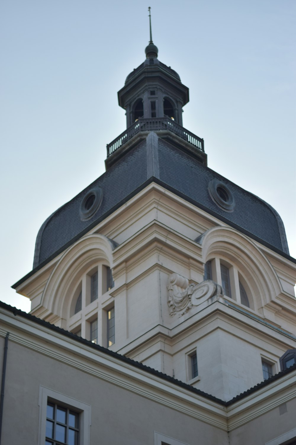 a building with a clock on the top of it