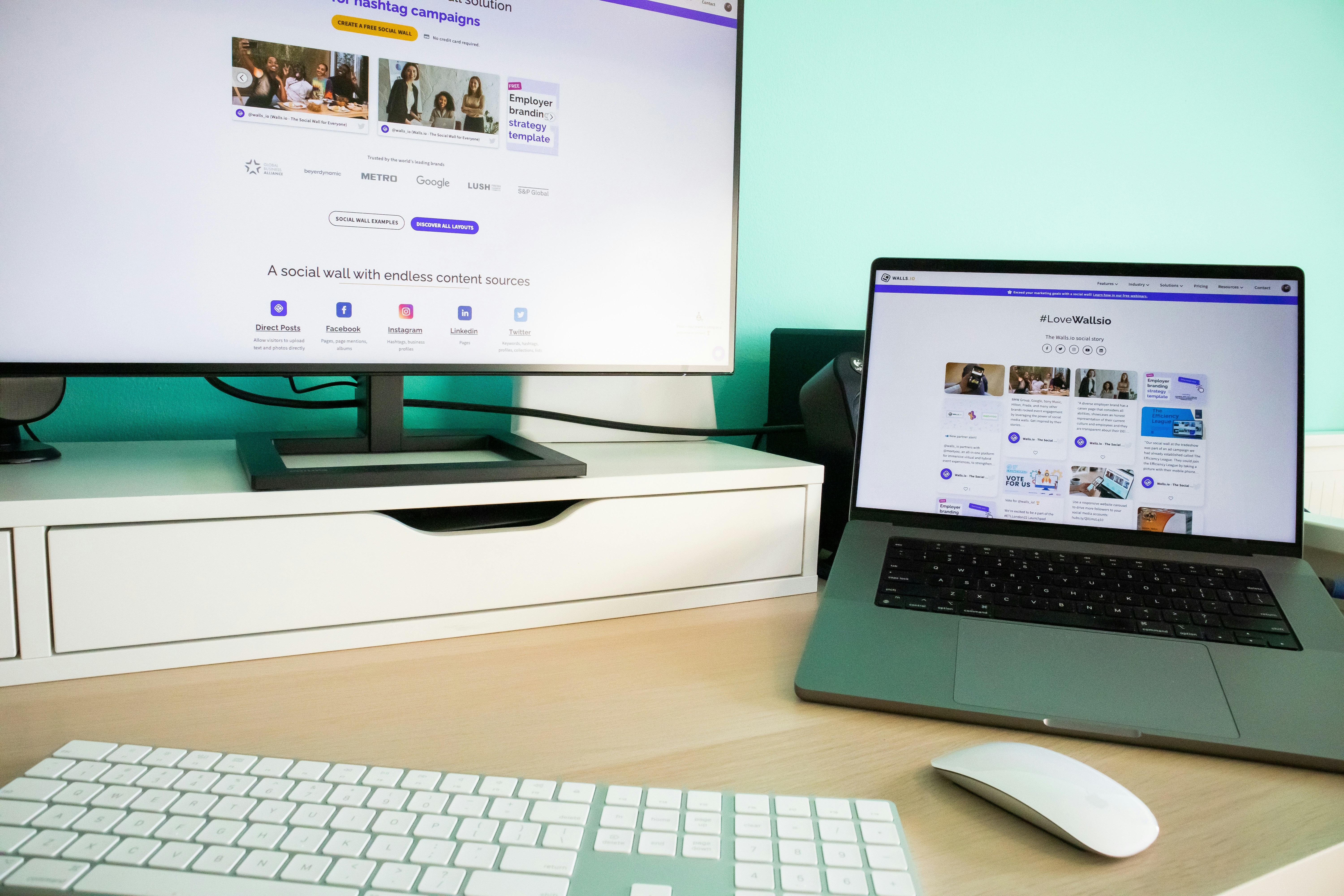 Modern web design workspace with laptop showing website designs