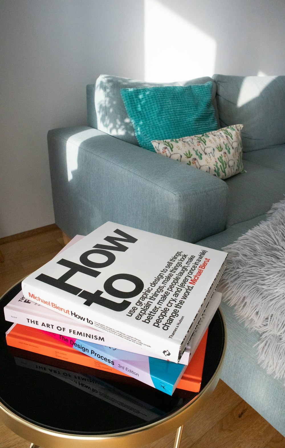 a stack of books sitting on top of a table