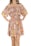 A person is wearing an off-shoulder dress with a floral pattern in warm tones of pink, peach, orange, and yellow. The dress features ruffled layers and a waist tie, and the person has their hands on their hips.