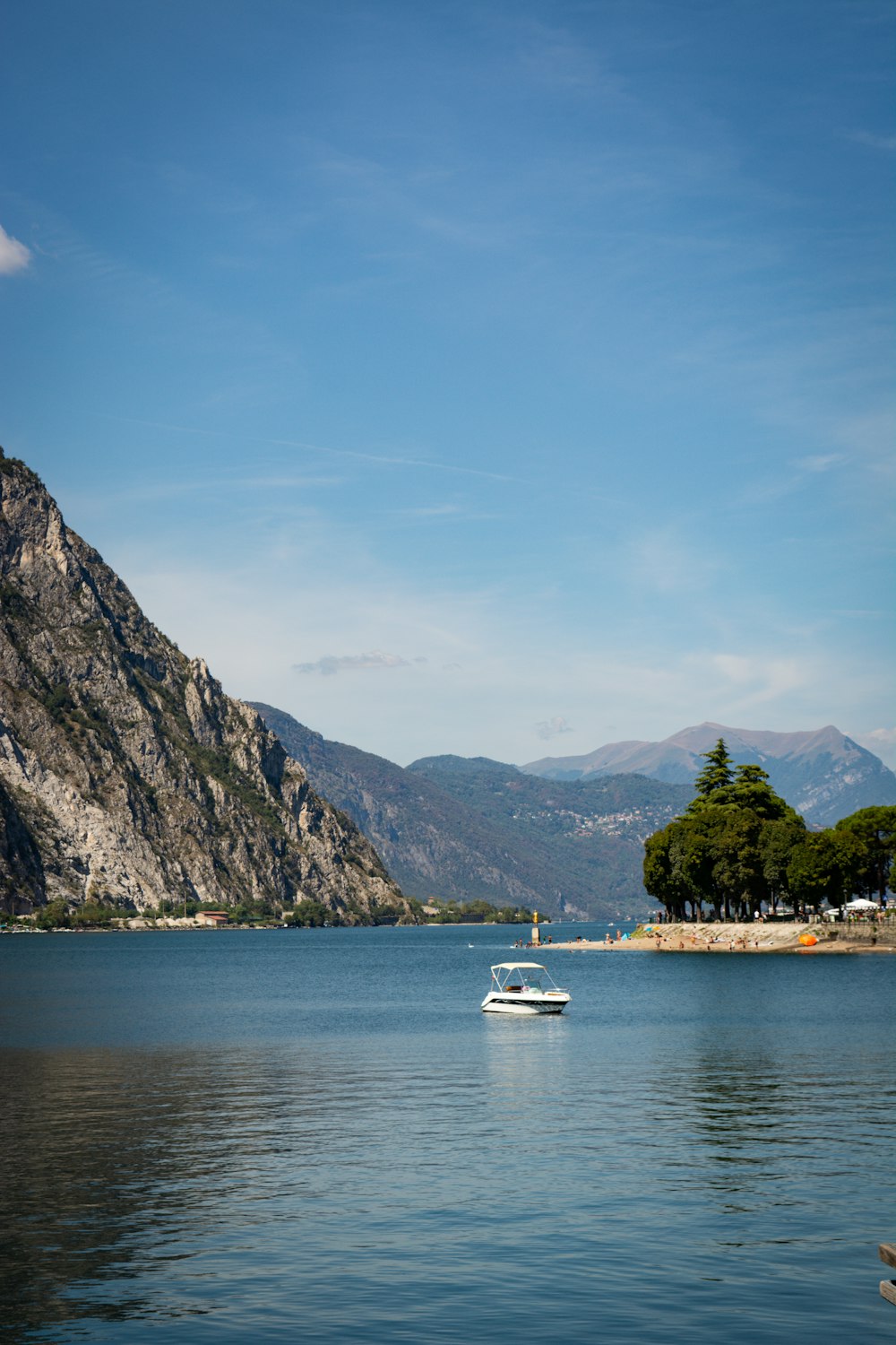 a boat floating on top of a large body of water