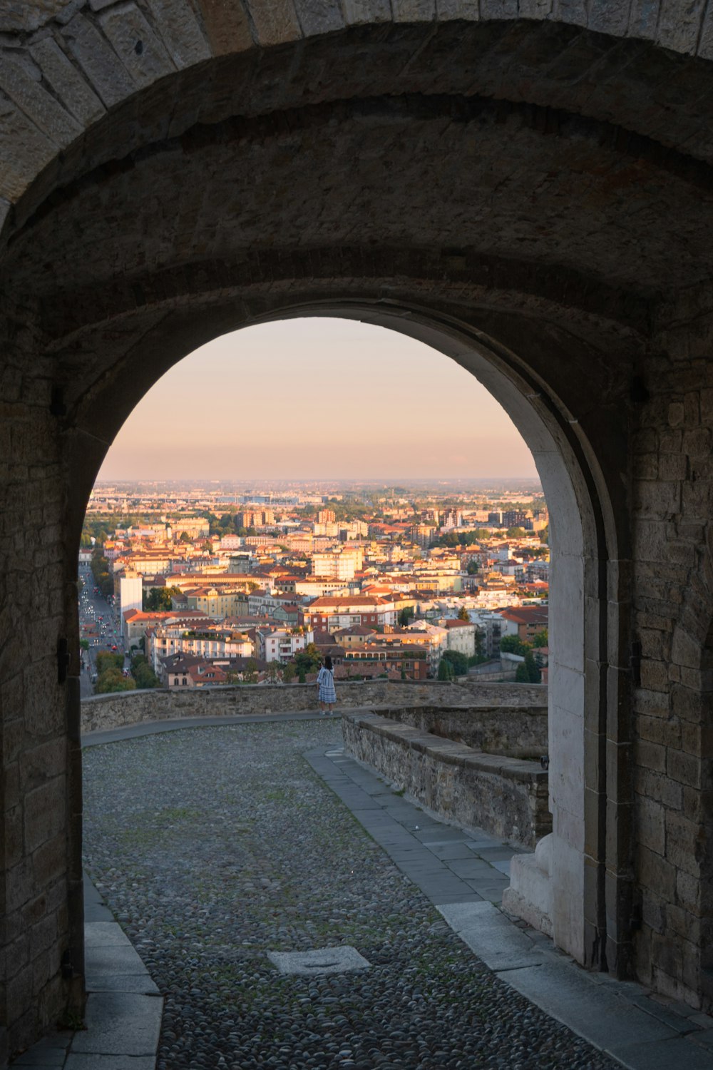 a view of a city through an archway