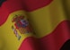 the flag of spain is waving in the wind