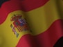 the flag of spain is waving in the wind