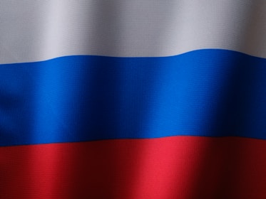 a close up of a red, white and blue flag