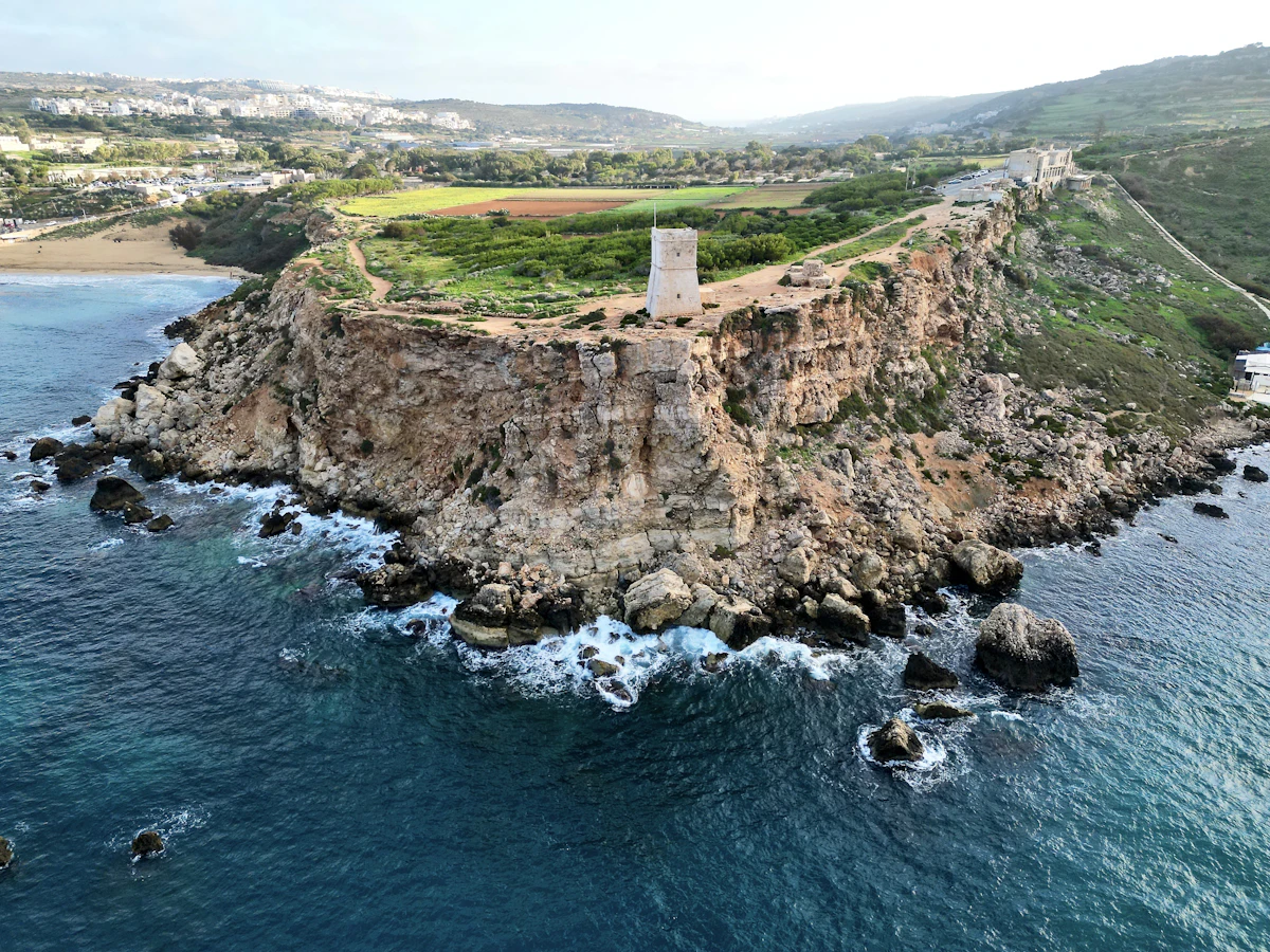 Tiny island aerial off a coast