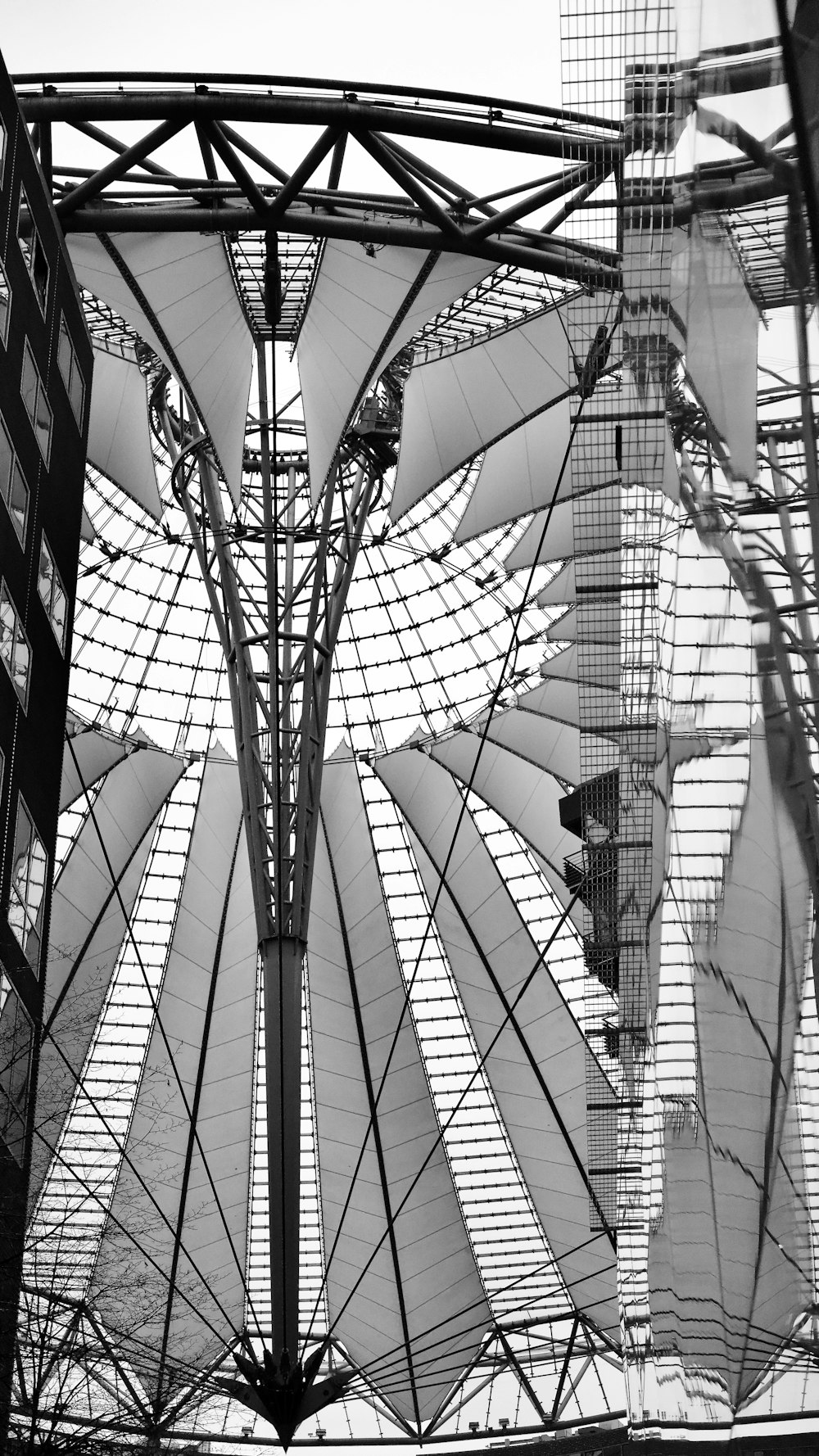 a black and white photo of the roof of a building