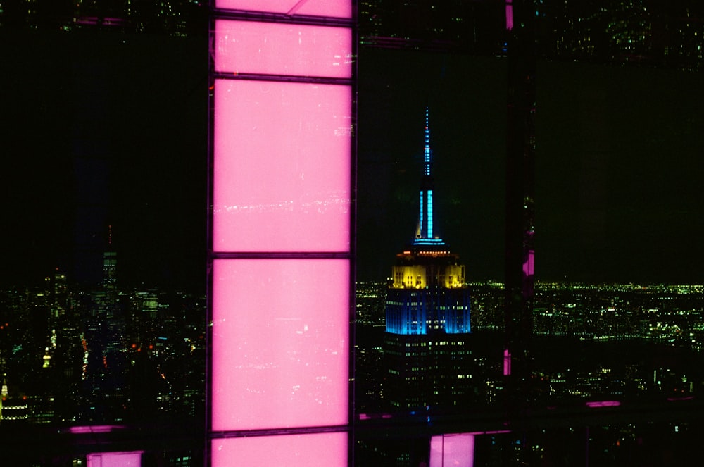 a view of a city at night from a tall building