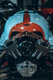 A close-up of a motorcycle's sleek engine and chrome details.
