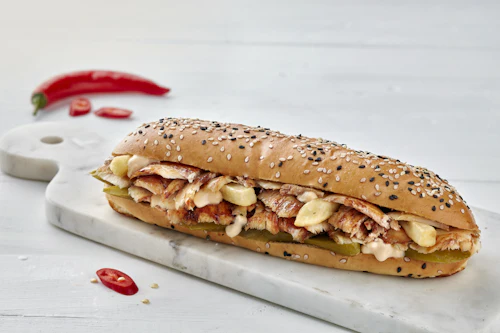 Toasted sesame sub sandwich with grilled chicken