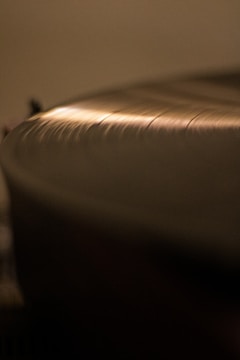 An image displaying a vinyl record restoration in progress.