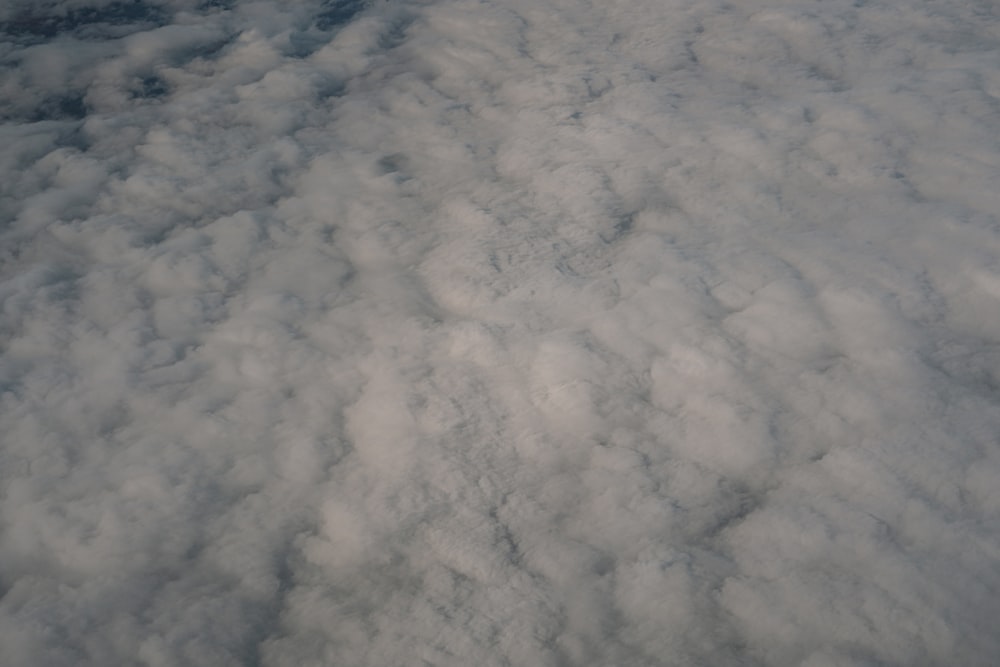 a view of clouds from an airplane window