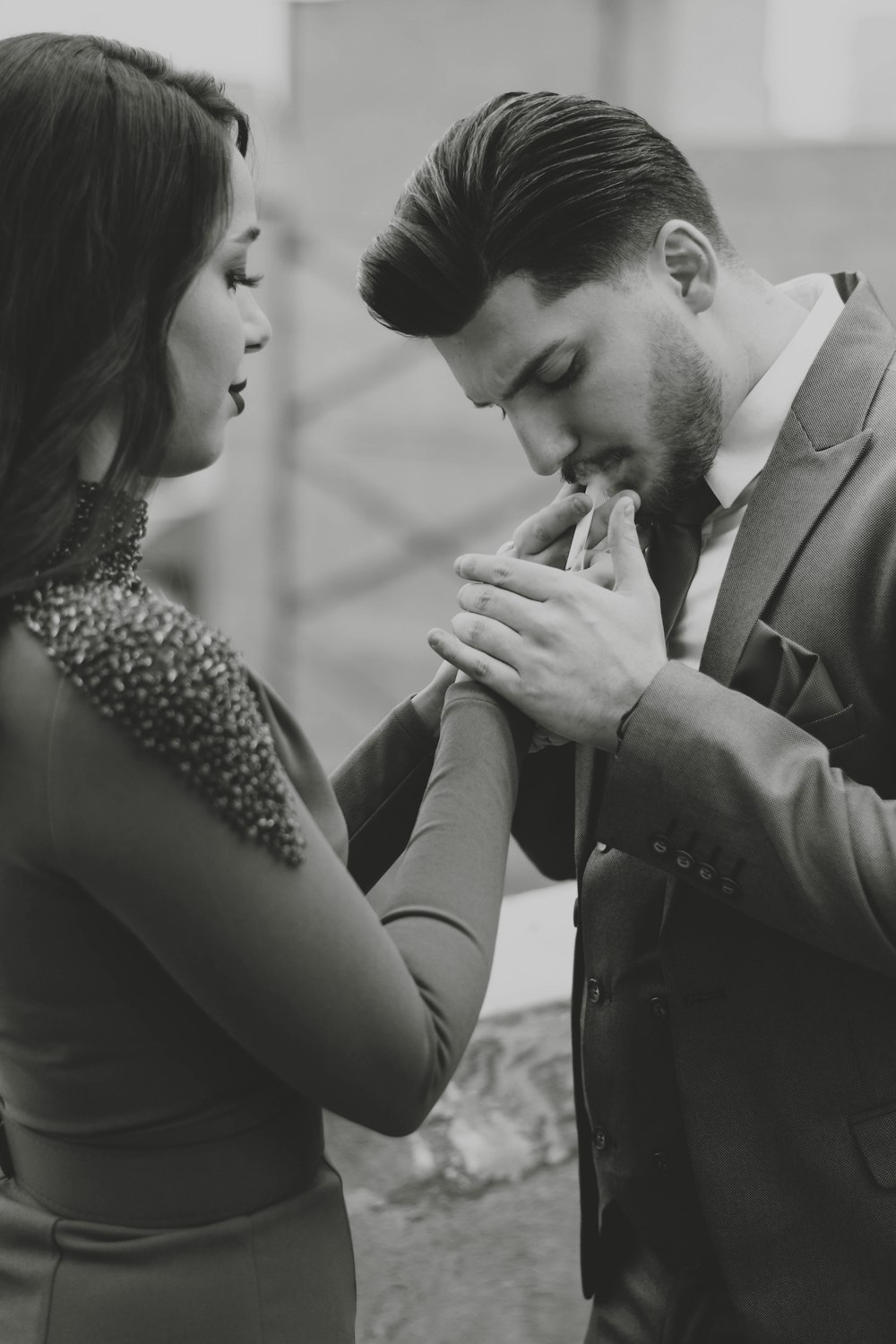 a man and a woman standing next to each other