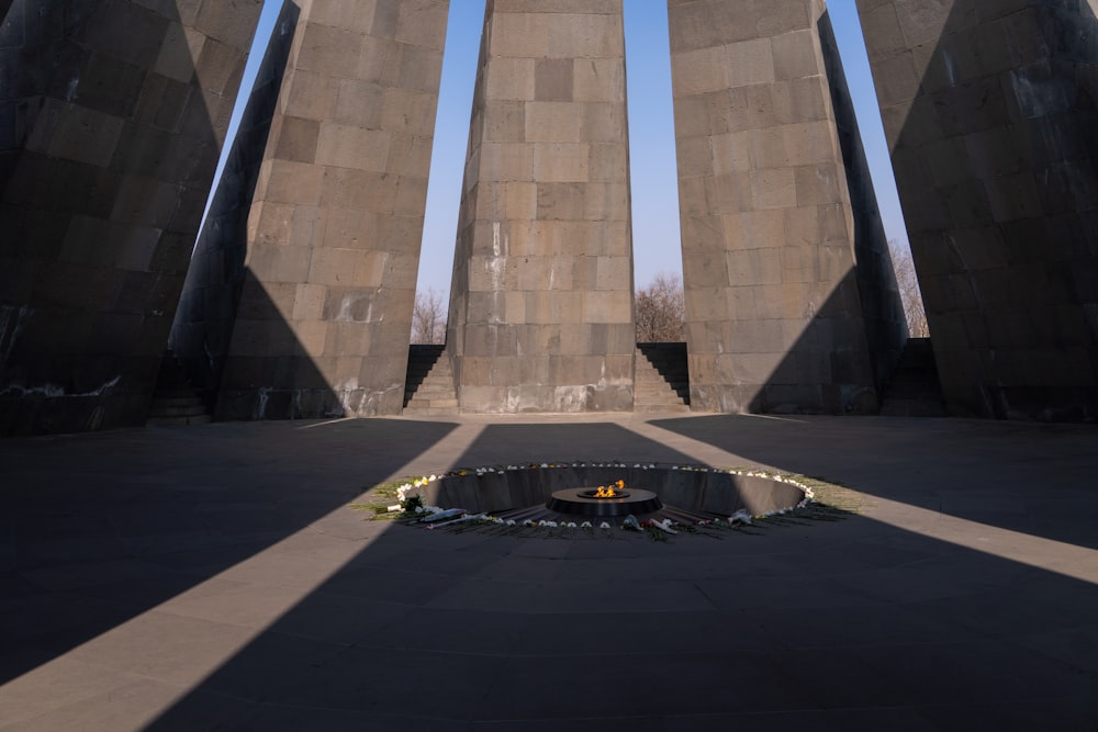 a monument with a fire place in the middle of it