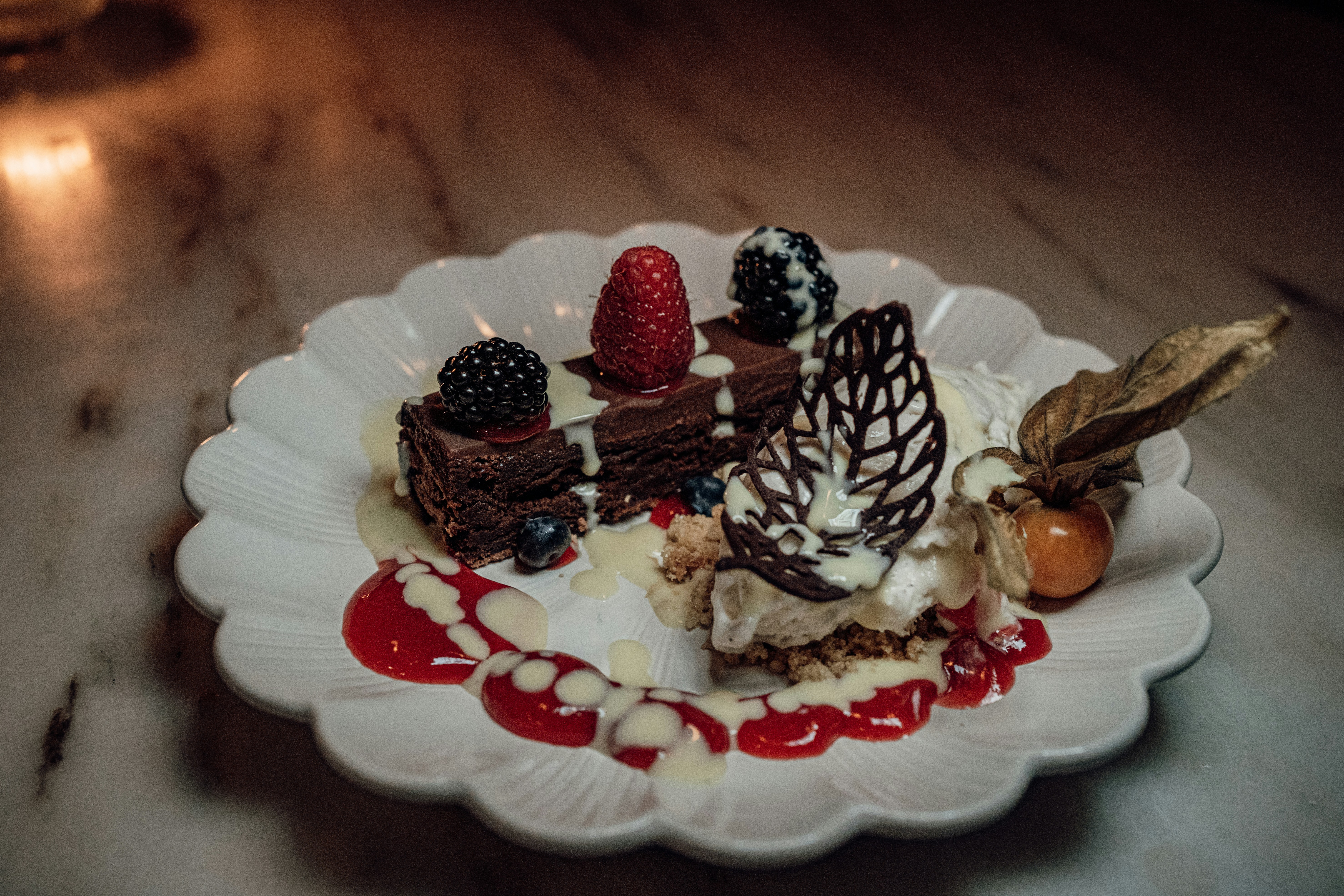 a white plate topped with a piece of cake, 