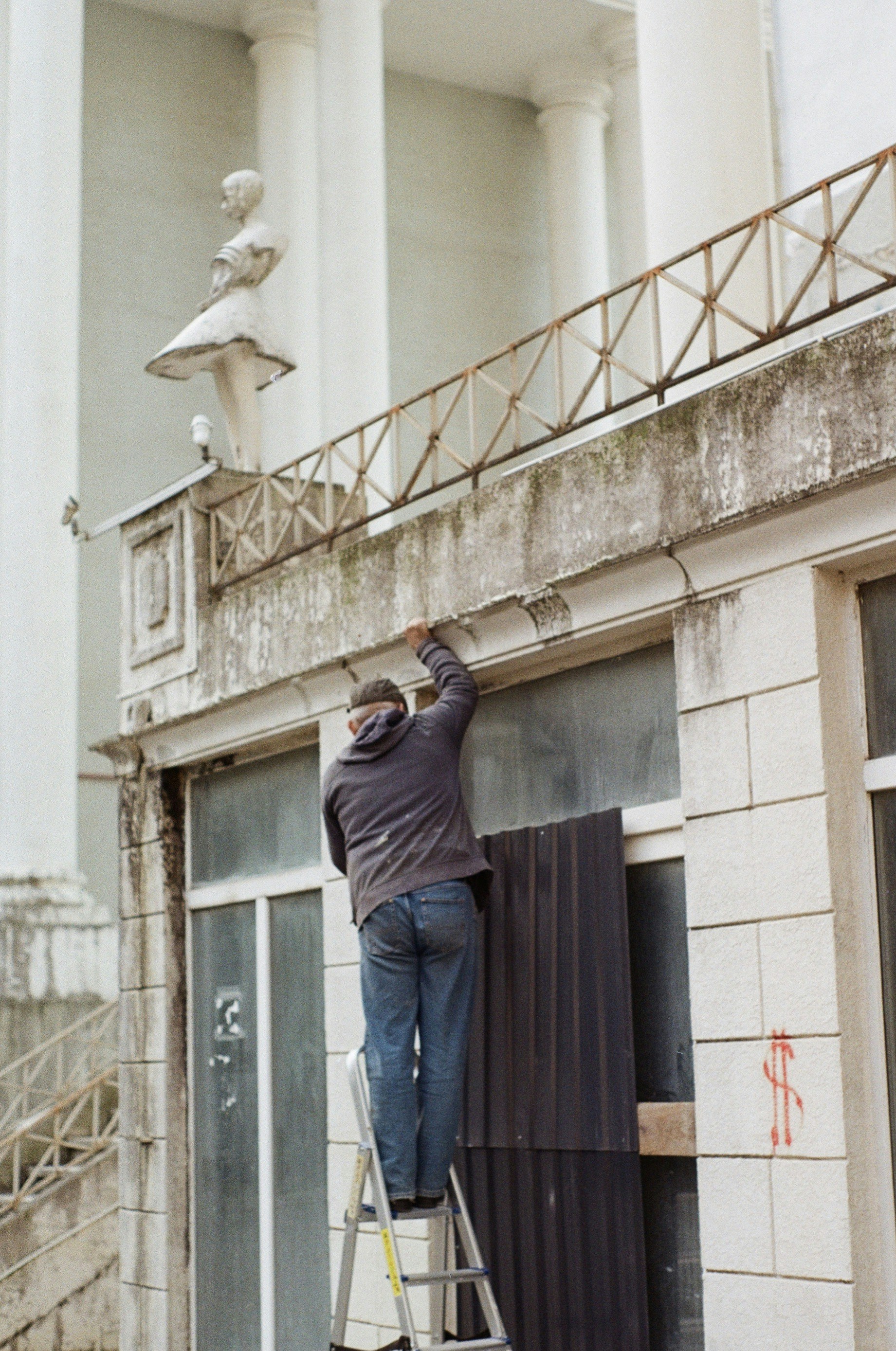 Technician installing a security camera