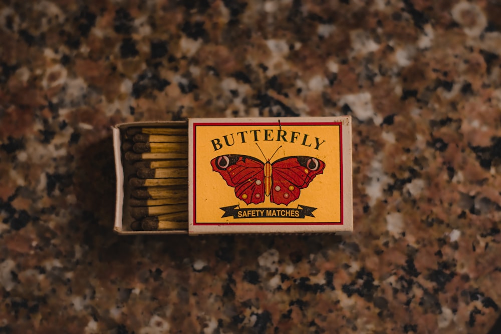 a box of butterfly cigarettes sitting on top of a counter