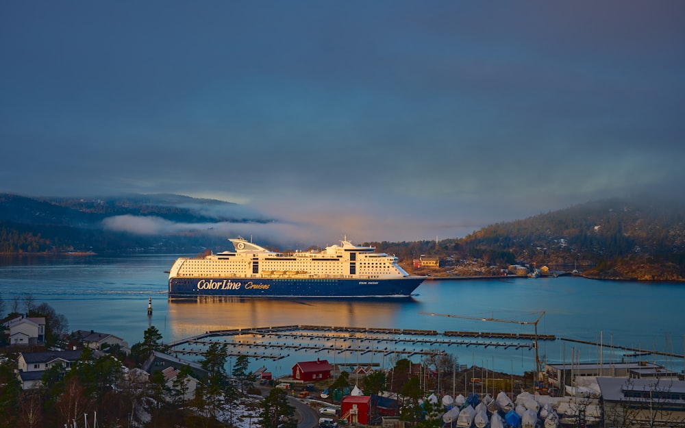 a cruise ship is docked in a harbor