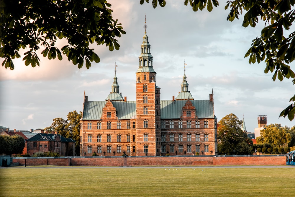 a large brick building with a clock tower