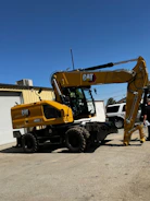 Construction machinery and equipment available for rent on a sunny day