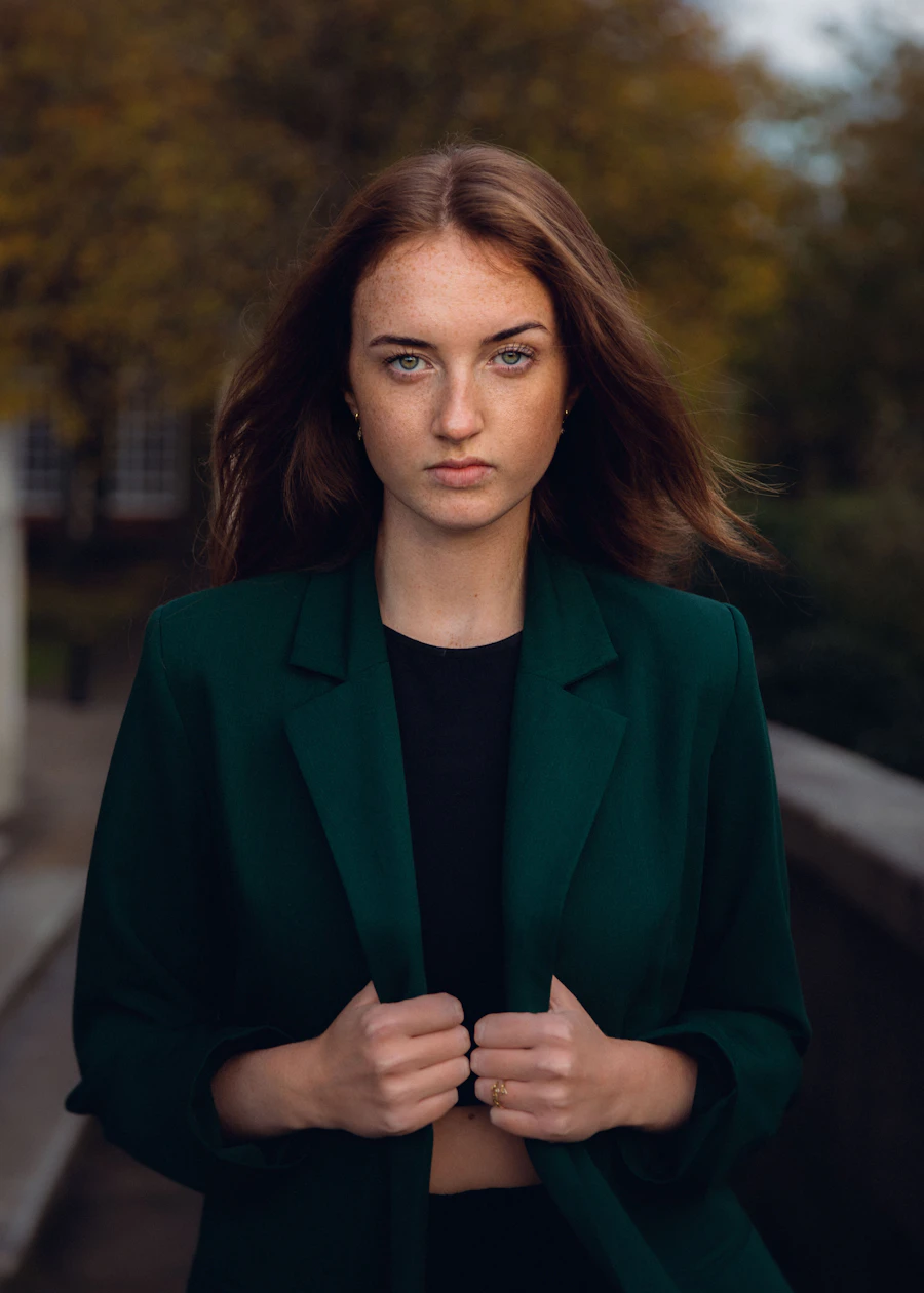 Confident woman in green blazer