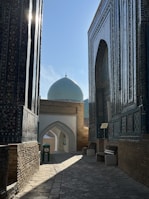 a large building with a blue dome on top of it