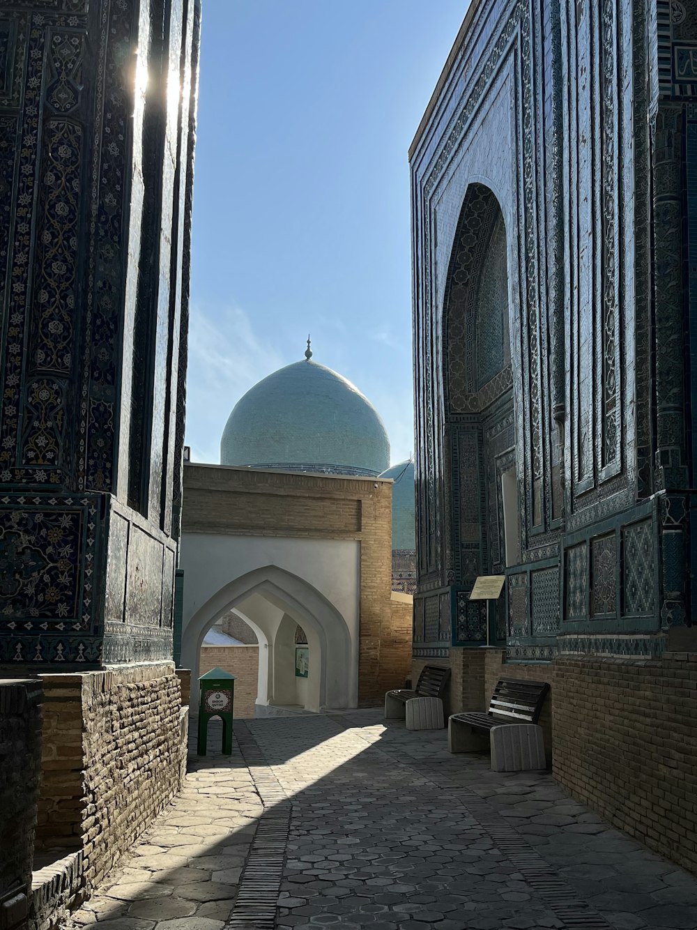 a large building with a blue dome on top of it