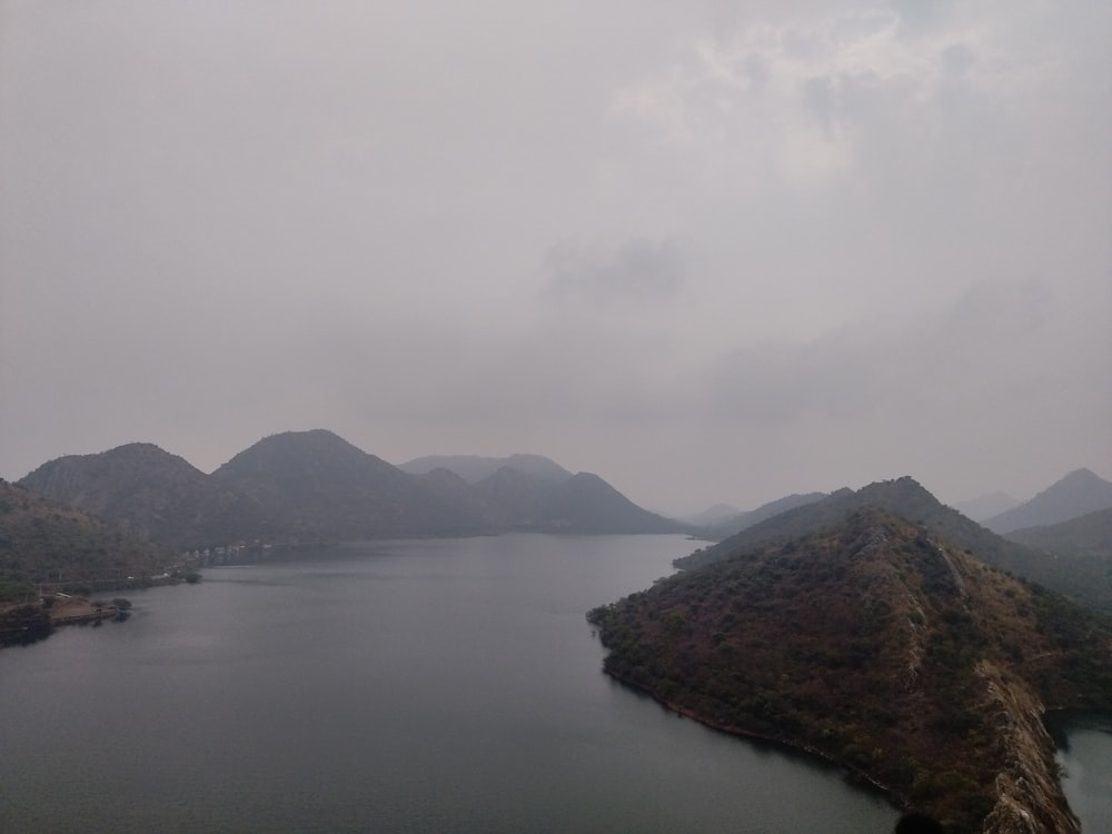 a large body of water surrounded by mountains