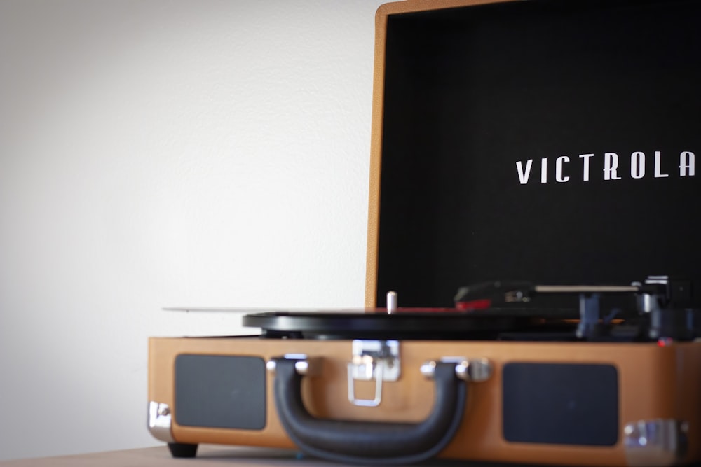 a suitcase with a record player inside of it