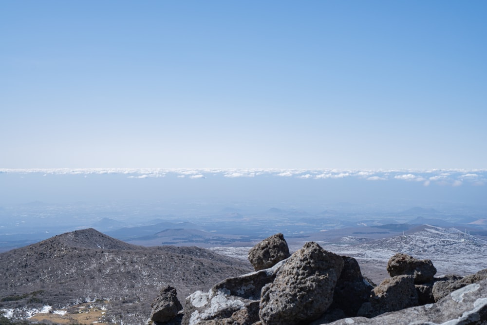 a view of a mountain range from the top of a mountain