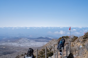 Pilgrims walking along a scenic path on the Holy Mountain.