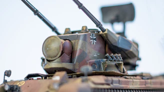 A sleek, high-tech military tank rolling through digital terrain, symbolizing tactical AI marketing.