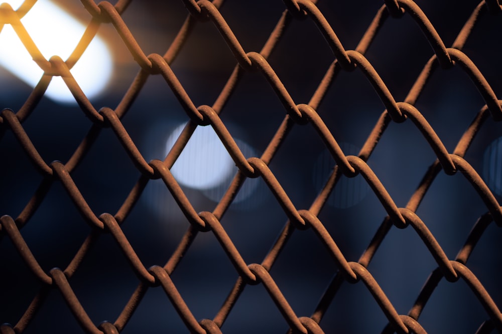 a close up of a chain link fence