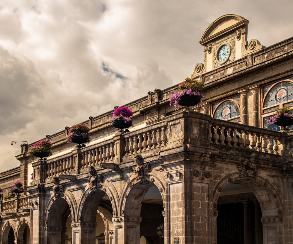 a large building with a clock on the top of it