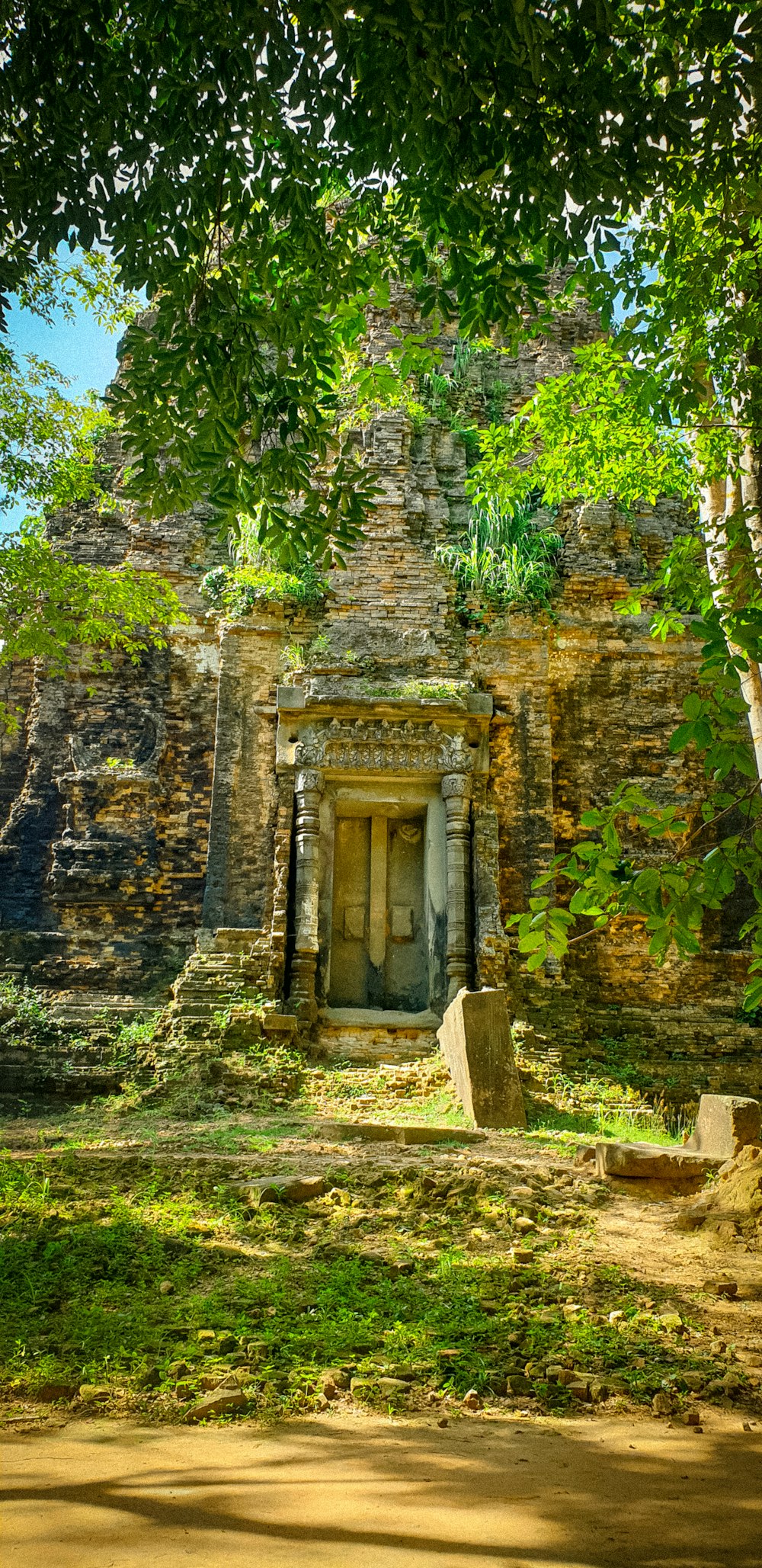 a stone building with a door in the middle of it