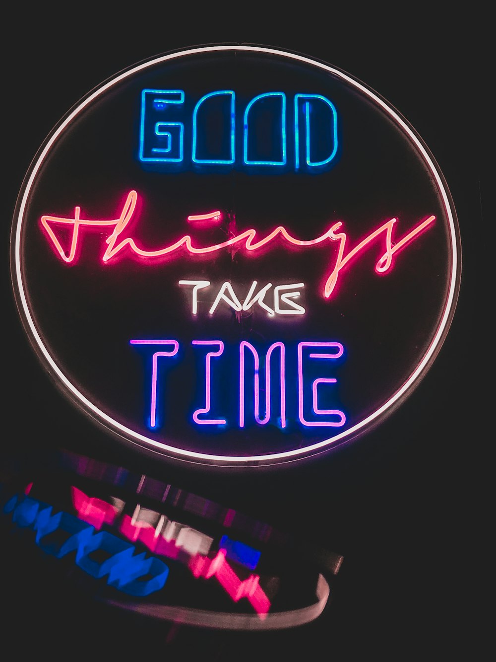 a neon sign that says good things take time