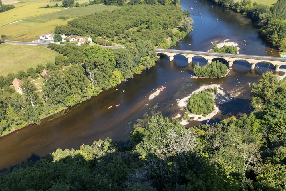 an aerial view of a bridge over a river