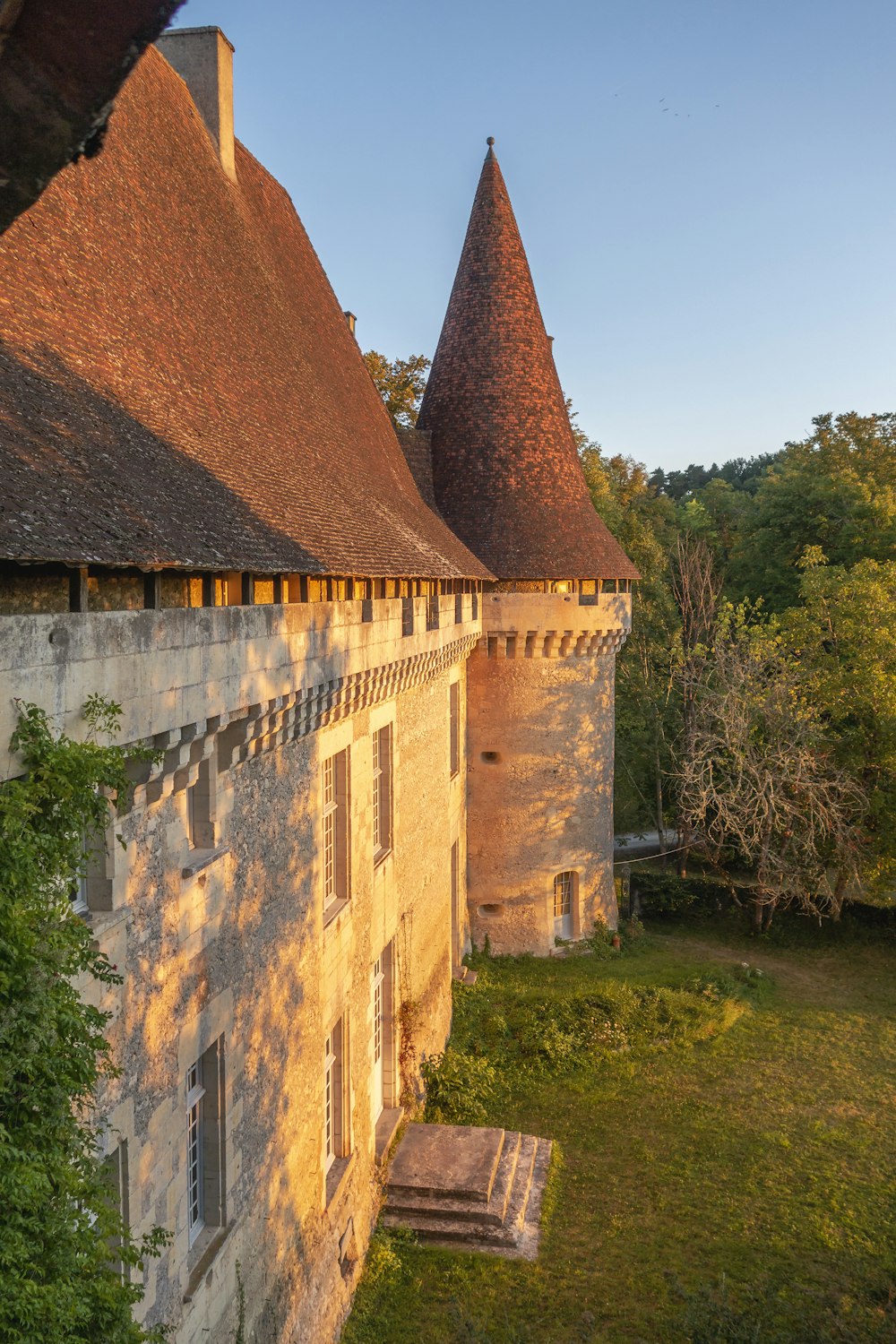 an old building with two towers on top of it